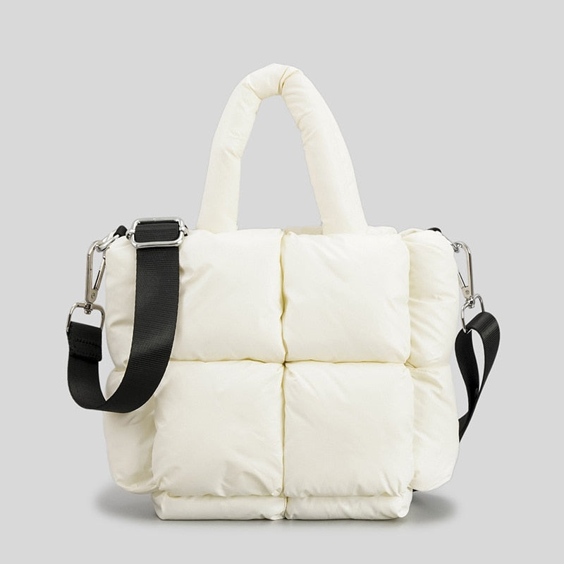 True Radiant Treasures winter quilted bag in vibrant colors. Functional and stylish with a secure zipper closure and inside pocket. Can be carried over the shoulder or across the body.