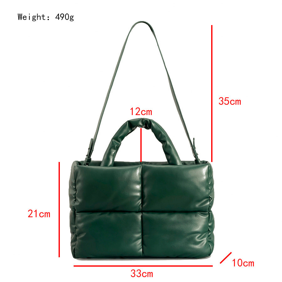 True Radiant Treasures winter quilted bag in vibrant colors. Functional and stylish with a secure zipper closure and inside pocket. Can be carried over the shoulder or across the body.