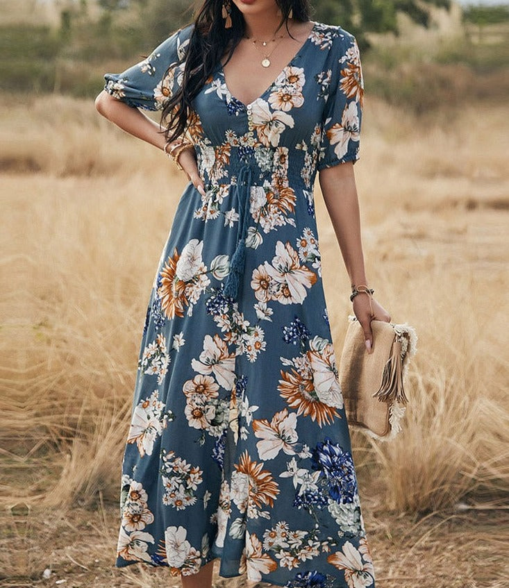 Long floral dress for spring and summer seasons - perfect for any occasion with its vibrant floral print and durable polyester material.
