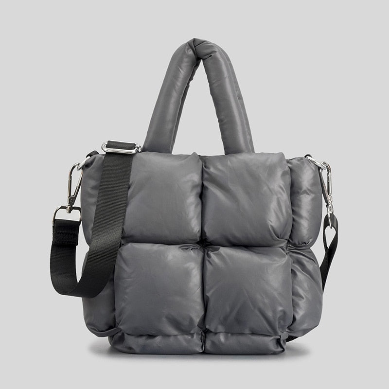 True Radiant Treasures winter quilted bag in vibrant colors. Functional and stylish with a secure zipper closure and inside pocket. Can be carried over the shoulder or across the body.