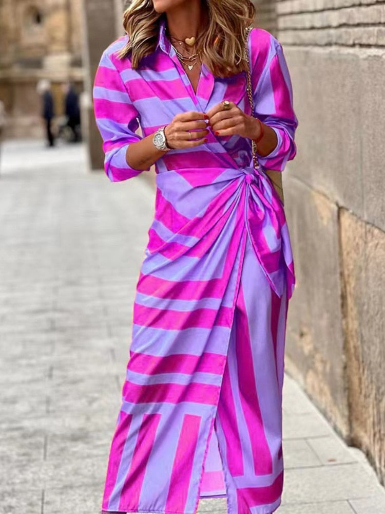 Stunning spring v-neck dress with ankle-length design, vibrant colors, and comfortable polyester-acetate fabric for a versatile and fashionable look.