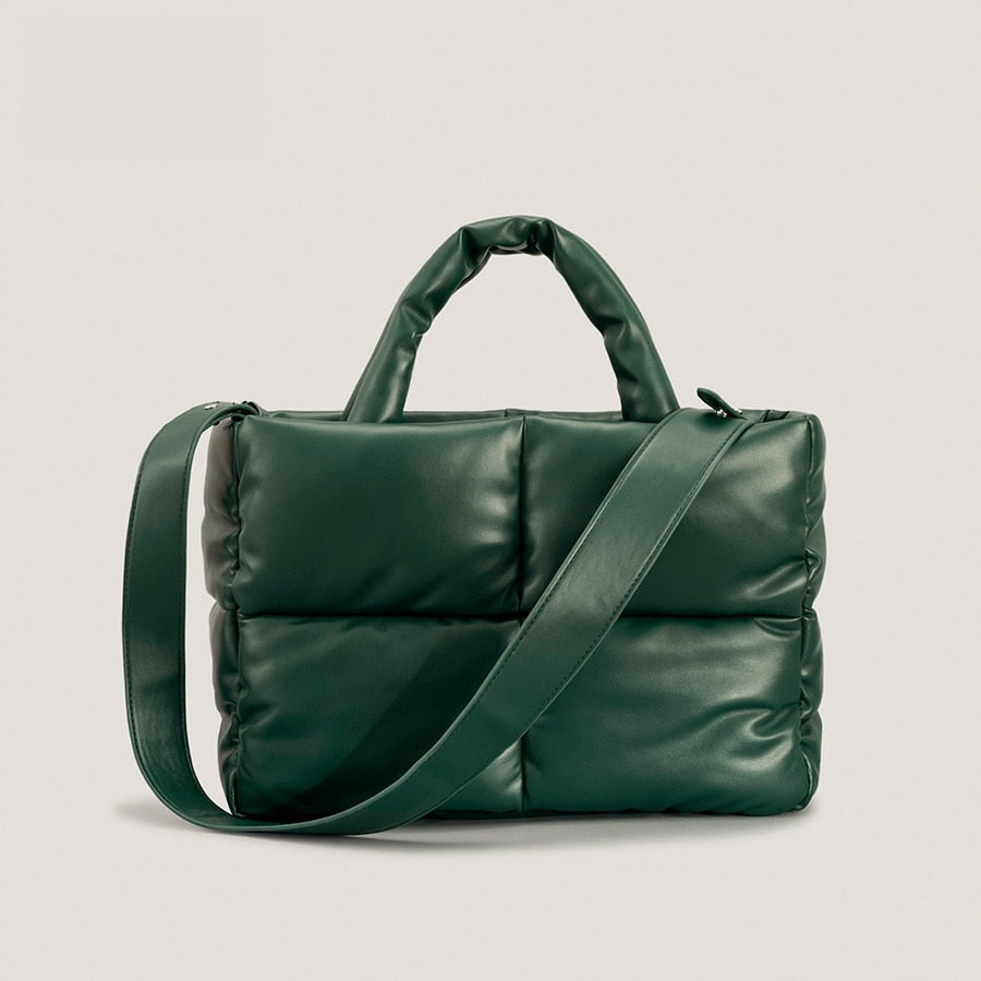 True Radiant Treasures winter quilted bag in vibrant colors. Functional and stylish with a secure zipper closure and inside pocket. Can be carried over the shoulder or across the body.