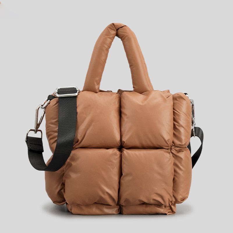 True Radiant Treasures winter quilted bag in vibrant colors. Functional and stylish with a secure zipper closure and inside pocket. Can be carried over the shoulder or across the body.