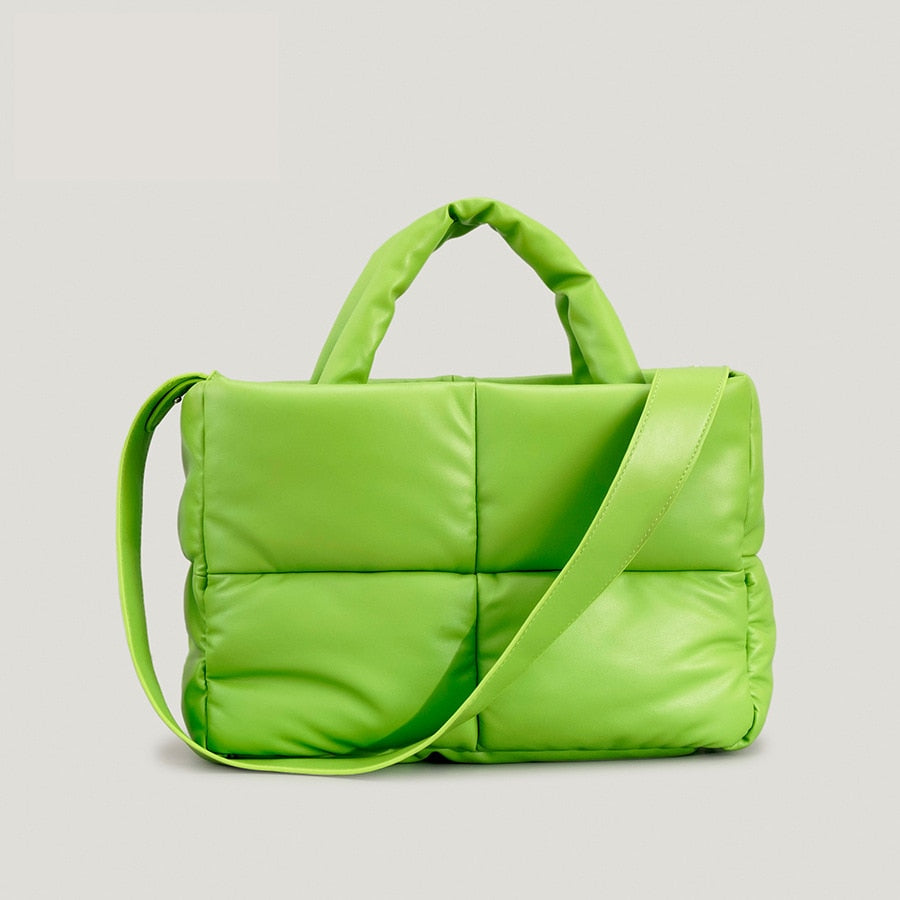 True Radiant Treasures winter quilted bag in vibrant colors. Functional and stylish with a secure zipper closure and inside pocket. Can be carried over the shoulder or across the body.