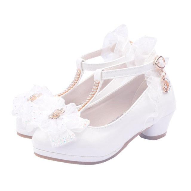 Stylish Peep shoes with cut-out flower designs, perfect for girls' dress-up or casual wear.
