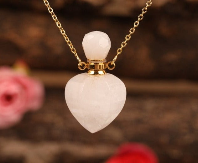 Heart-shaped Gold Silvery Necklace with treated rose quartz stone - A versatile and elegant accessory for women, promoting emotional bonding and desire.