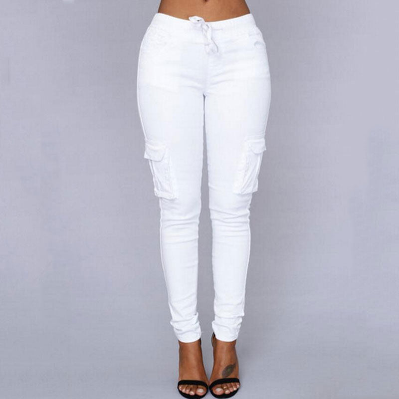 A woman wearing High Waist Jogger Pants in black color with pockets, elastic waistband and drawstring closure