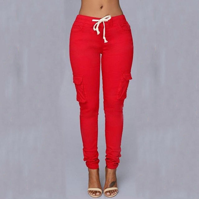 A woman wearing High Waist Jogger Pants in black color with pockets, elastic waistband and drawstring closure
