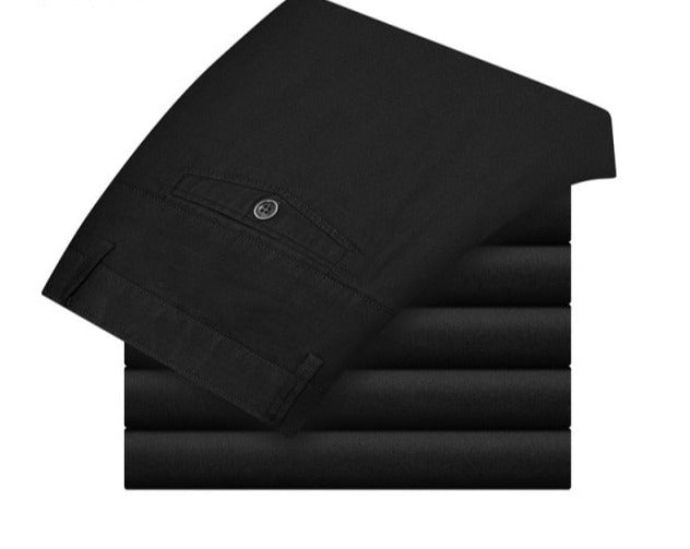 A pair of stylish trousers with a unique shirt gripper feature, designed to keep your shirt in place. Versatile for any occasion, featuring a stretch waistband for comfort.