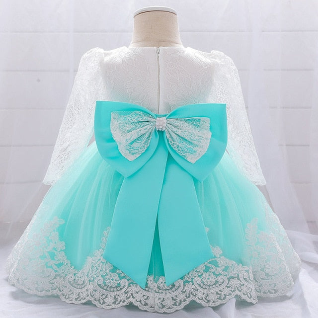 Flower Princess Dress - Adorable holiday dress with princess style, ribbons, and flowers, suitable for girls aged 0-6 months, 7-12 months, and 13-24 months.