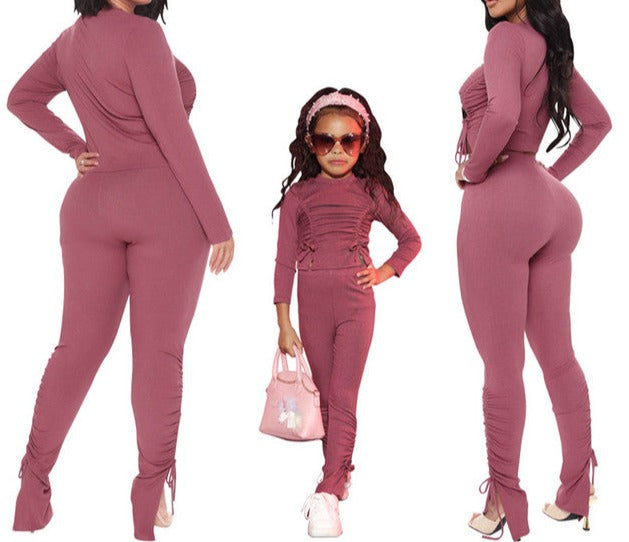 Image of stylish Elastic Slim Sportswear Set for Mommy and Me, made of polyester. Perfect for mother-daughter workouts. Grab yours now while supplies last!