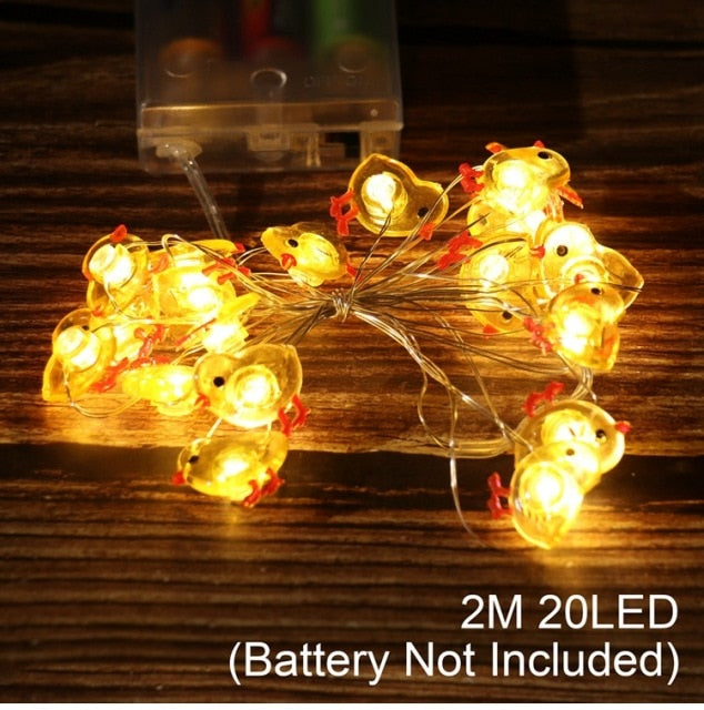 Add some spring cheer to your Easter decorations with our Easter LED Bunny String Lights! These festive lights are perfect for brightening up any space and impressing your guests. Hang them in a variety of ways - from walls to flower pots to mantelpieces - and watch your decor come to life. Don't miss out on this fun and versatile decoration. Shop now and light up your Easter!