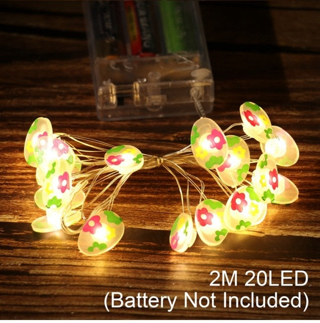 Add some spring cheer to your Easter decorations with our Easter LED Bunny String Lights! These festive lights are perfect for brightening up any space and impressing your guests. Hang them in a variety of ways - from walls to flower pots to mantelpieces - and watch your decor come to life. Don't miss out on this fun and versatile decoration. Shop now and light up your Easter!
