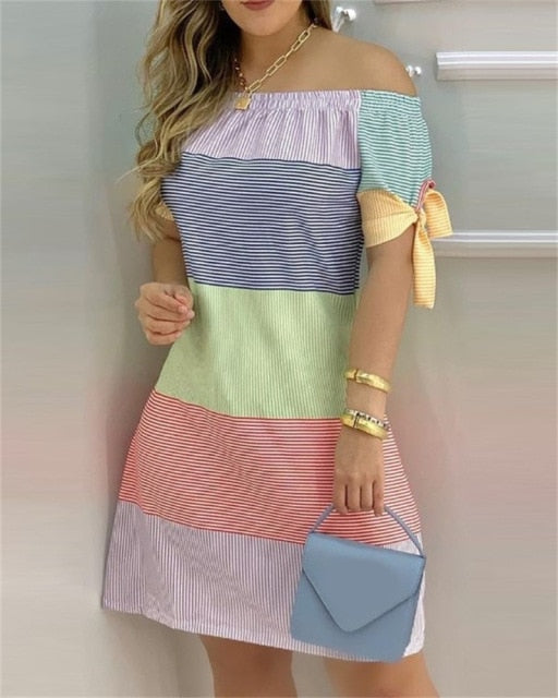Stylish and comfortable Off-Shoulder Spring Mini Dress, made from polyester, perfect for casual meetings or special events, easily paired with accessories and various footwear