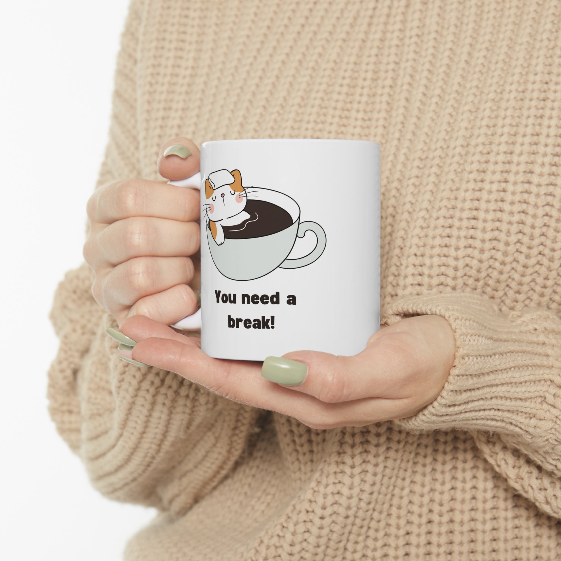 Custom-designed ceramic mug with "You Need a Break" design, 11 oz capacity.