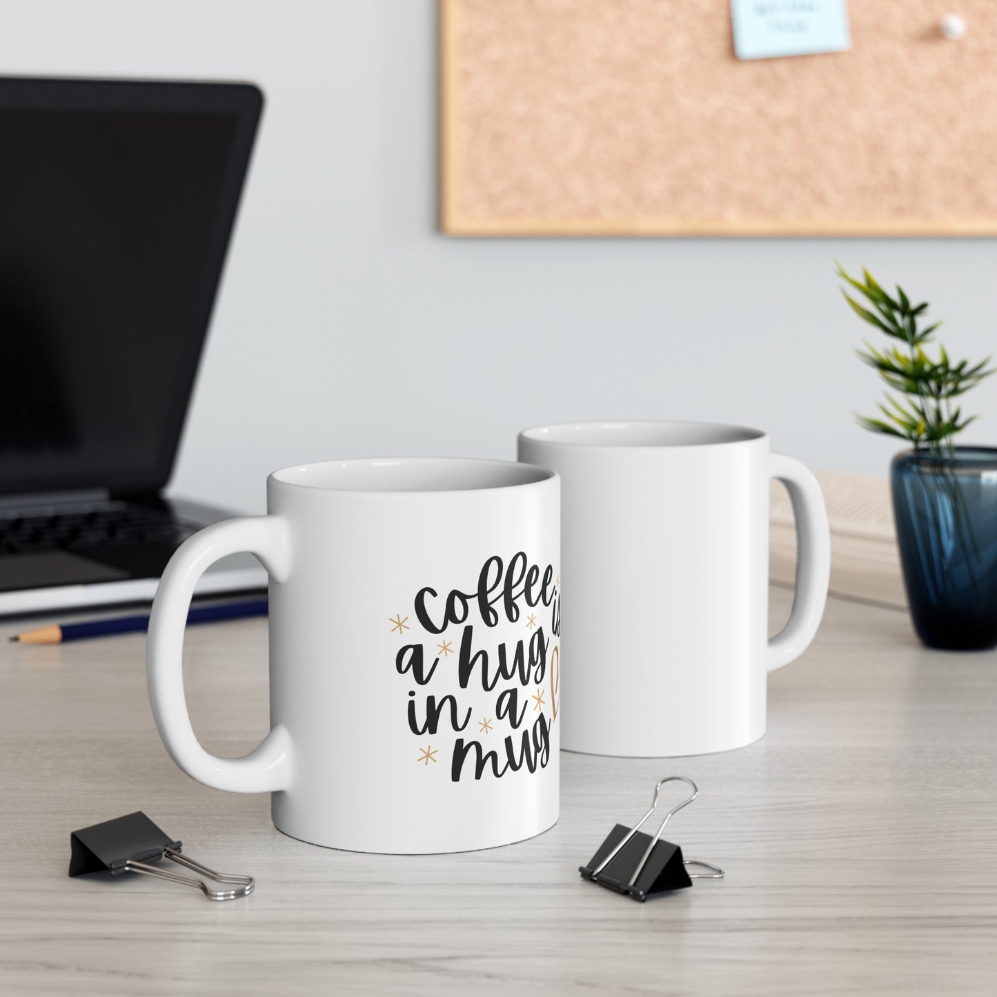 Custom-designed ceramic mug with "Coffee is a Hug in a Mug" design, 11 oz capacity.