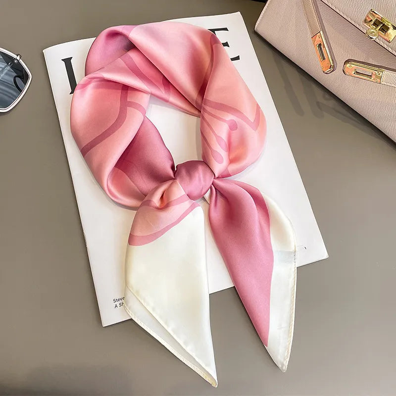 Image of Sophisticated Silk Satin Hijab Scarf, a polyester scarf with sun protection features, measuring 70cm x 70cm, and available in six colors. Perfect for spring and summer outings.