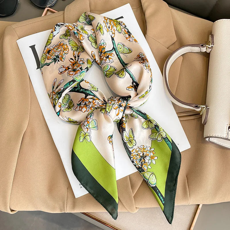 Image of Sophisticated Silk Satin Hijab Scarf, a polyester scarf with sun protection features, measuring 70cm x 70cm, and available in six colors. Perfect for spring and summer outings.