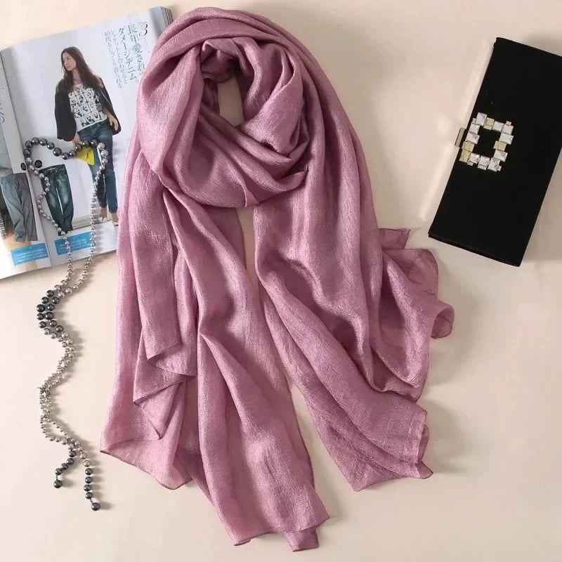 Image of Spring and Summer Linen Beach Scarf, a high-quality linen scarf perfect for beach outings. Versatile in style, it can be worn as both a scarf and a shawl.