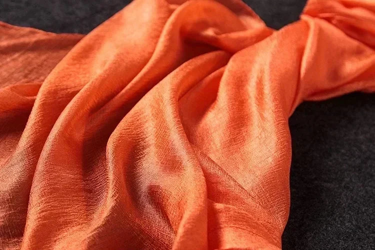 Image of Spring and Summer Linen Beach Scarf, a high-quality linen scarf perfect for beach outings. Versatile in style, it can be worn as both a scarf and a shawl.