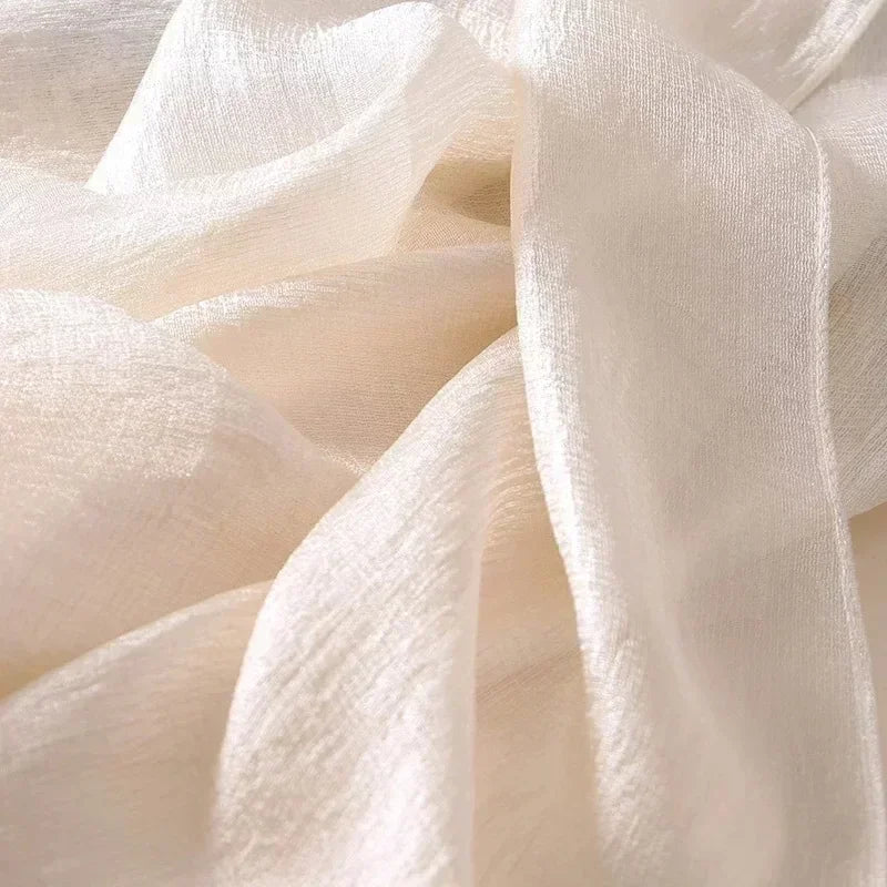 Image of Spring and Summer Linen Beach Scarf, a high-quality linen scarf perfect for beach outings. Versatile in style, it can be worn as both a scarf and a shawl.