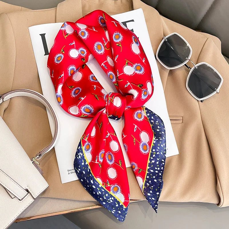 Image of Sophisticated Silk Satin Hijab Scarf, a polyester scarf with sun protection features, measuring 70cm x 70cm, and available in six colors. Perfect for spring and summer outings.