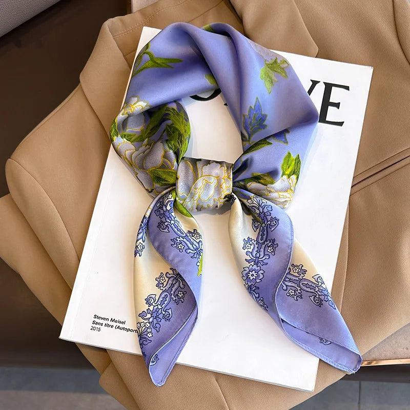 Image of Sophisticated Silk Satin Hijab Scarf, a polyester scarf with sun protection features, measuring 70cm x 70cm, and available in six colors. Perfect for spring and summer outings.