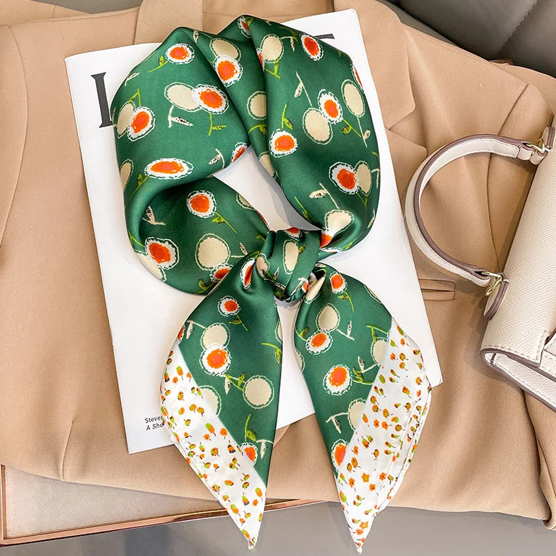 Image of Sophisticated Silk Satin Hijab Scarf, a polyester scarf with sun protection features, measuring 70cm x 70cm, and available in six colors. Perfect for spring and summer outings.