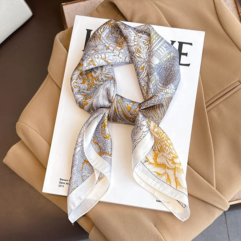 Image of Sophisticated Silk Satin Hijab Scarf, a polyester scarf with sun protection features, measuring 70cm x 70cm, and available in six colors. Perfect for spring and summer outings.