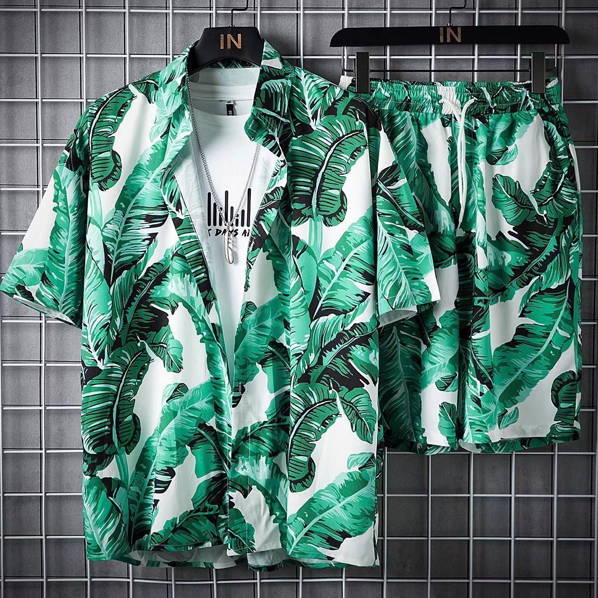 Men's Beachwear Set with Korean and vintage style. Crafted from a cotton polyester blend. Featuring a digital printing pattern, mandarin collar, and single-breasted closure. Perfect for spring and summer. Brand: FEATHER STEP.