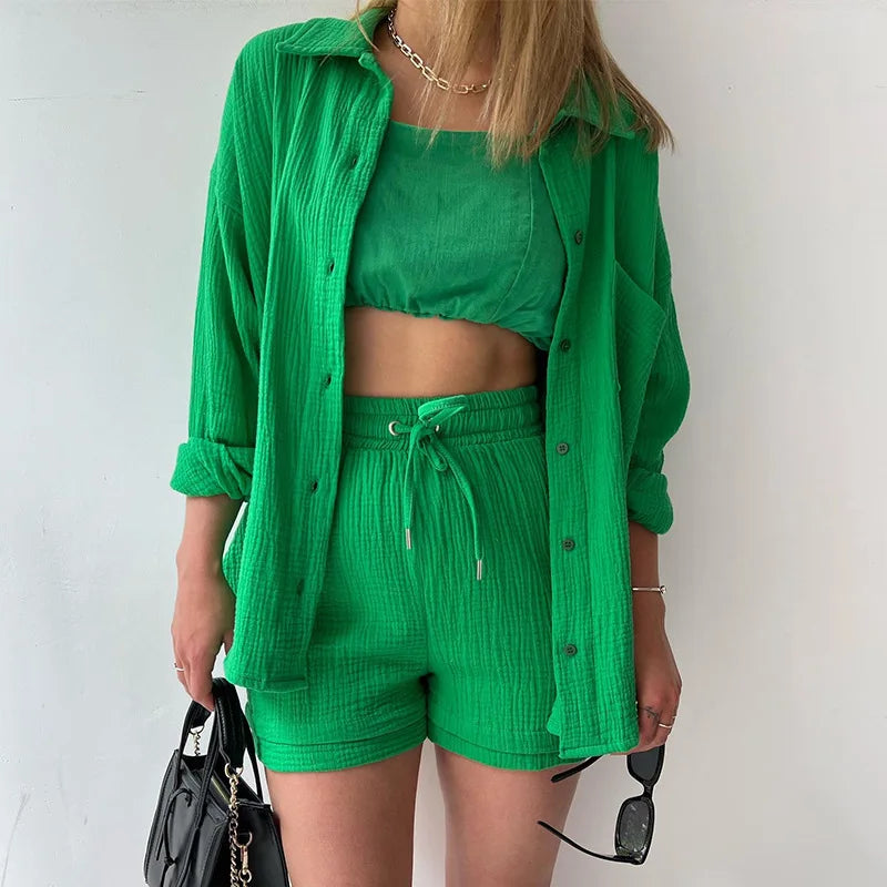 Two-Piece Buttoned Short Set for Women - Casual polo-neck top and knee-length pants set made from high-quality cotton fabric. Perfect for spring/summer 2024.