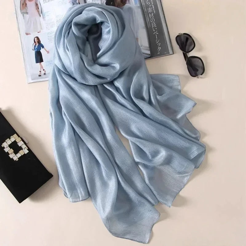 Image of Spring and Summer Linen Beach Scarf, a high-quality linen scarf perfect for beach outings. Versatile in style, it can be worn as both a scarf and a shawl.