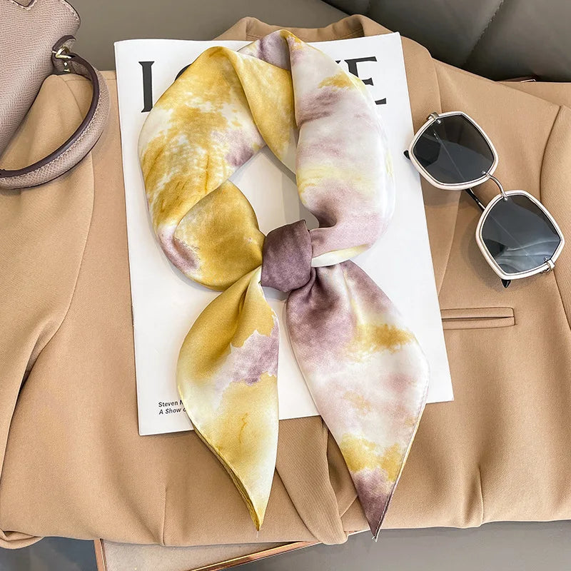 Image of Sophisticated Silk Satin Hijab Scarf, a polyester scarf with sun protection features, measuring 70cm x 70cm, and available in six colors. Perfect for spring and summer outings.