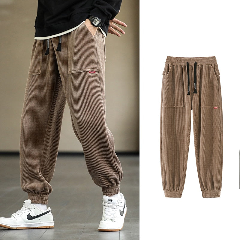 Men's Autumn Corduroy Sweatpants - Comfortable midweight design with drawstring closure. Available in sizes M to 8XL, in colors like Black, Blue, Grey, White, Yellow, and Brown. Perfect for autumn and winter.