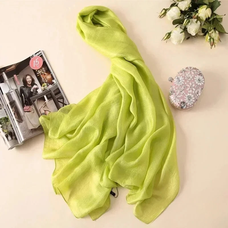 Image of Spring and Summer Linen Beach Scarf, a high-quality linen scarf perfect for beach outings. Versatile in style, it can be worn as both a scarf and a shawl.