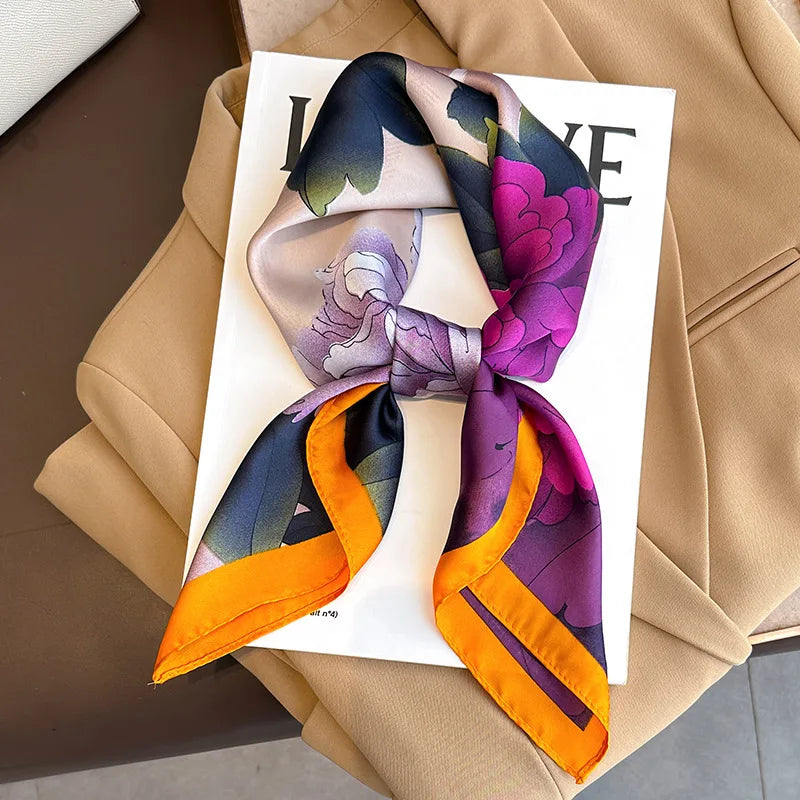 Image of Sophisticated Silk Satin Hijab Scarf, a polyester scarf with sun protection features, measuring 70cm x 70cm, and available in six colors. Perfect for spring and summer outings.