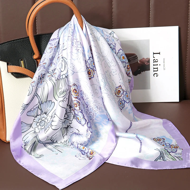 Image of Sophisticated Silk Satin Hijab Scarf, a polyester scarf with sun protection features, measuring 70cm x 70cm, and available in six colors. Perfect for spring and summer outings.