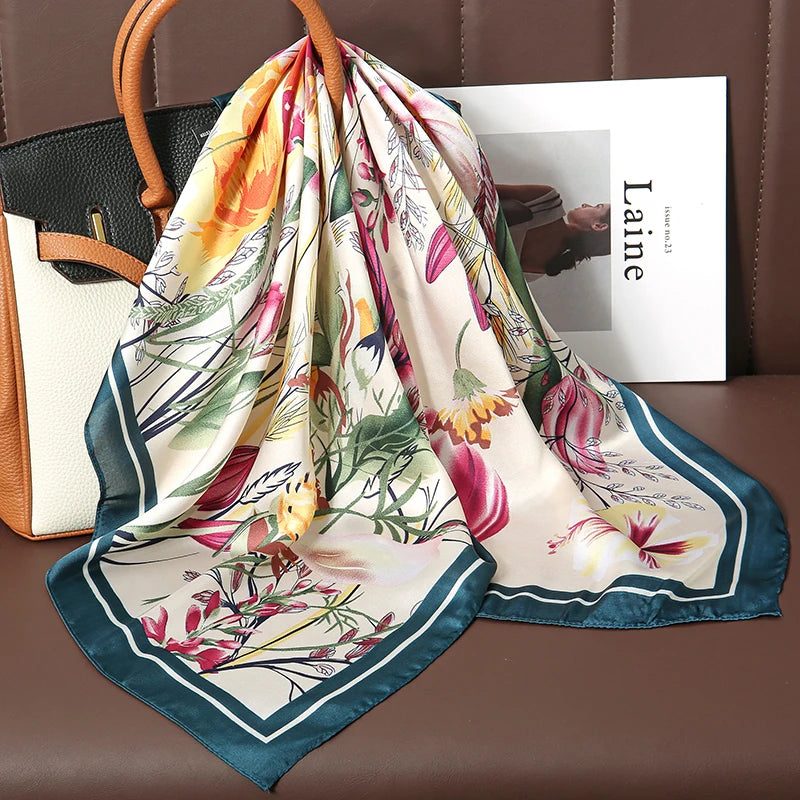 Image of Sophisticated Silk Satin Hijab Scarf, a polyester scarf with sun protection features, measuring 70cm x 70cm, and available in six colors. Perfect for spring and summer outings.