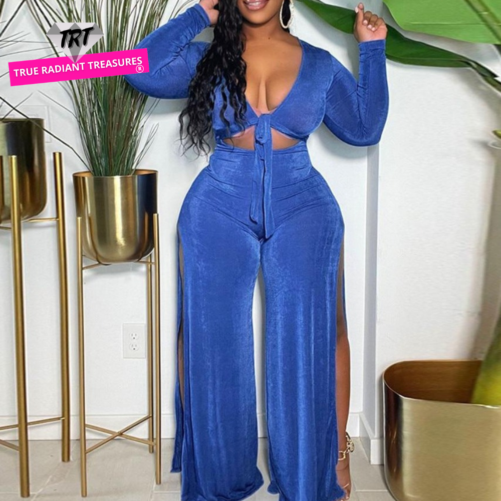 A 2-Piece Classy Tracksuit perfect for fall, featuring a long sleeve top and wide-leg pants. Trendy, classy, and sexy with a plunging neckline and slits on both sides of the pants. Available in blue and pink and in different sizes to fit you perfectly. Ideal for dates, parties, and other casual occasions. Switch up your style this fall and get yours now!