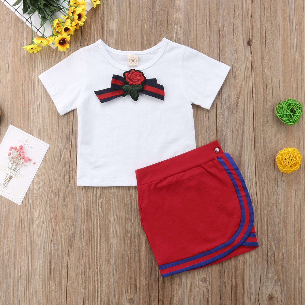  Image of Mini Skirt Set - Adorable and comfortable outfit for little girls. Made with high-quality cotton. Perfect for playtime and looking cute. Fits true to size. Let your little one shine in this fashionable set!