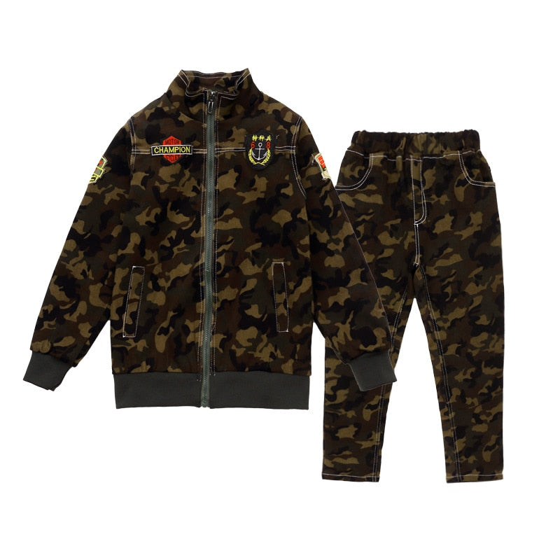 Boy wearing camouflage long-sleeve and pants set, made of cotton for comfort. Perfect for the classroom and playground. Please check our sizing chart for accurate measurements.