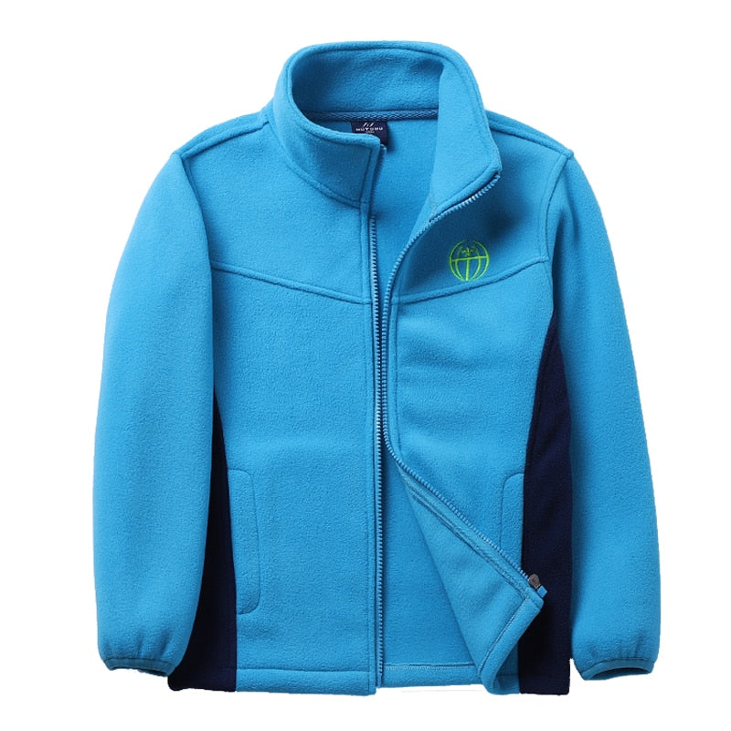 Soft Shell Fleece Jacket for kids in cotton and polyester blend, perfect for winter warmth and outdoor fun.