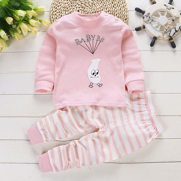 Image of Toddler Tracksuit - Made of comfortable and durable cotton and polyester. Vibrant prints and designs for unrestricted movement. Ideal for spring and summer activities.