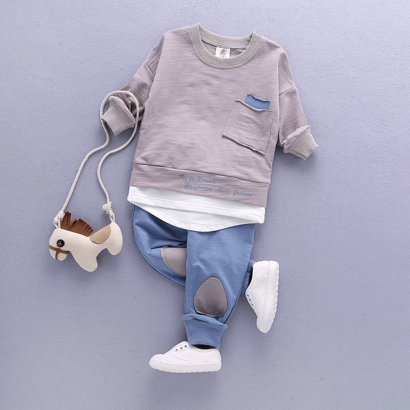 A long-sleeved casual sportswear made of light and breathable cotton, perfect for kids to wear during spring and summer. The cute color adds to its appeal, making it a must-have for your kids' wardrobe. Get it now and spend quality time with your kids in comfort and style.