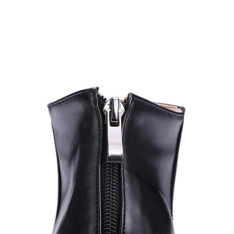 Fine Root Zipper Boots - Stylish winter boots with high heels and a pointed toe.