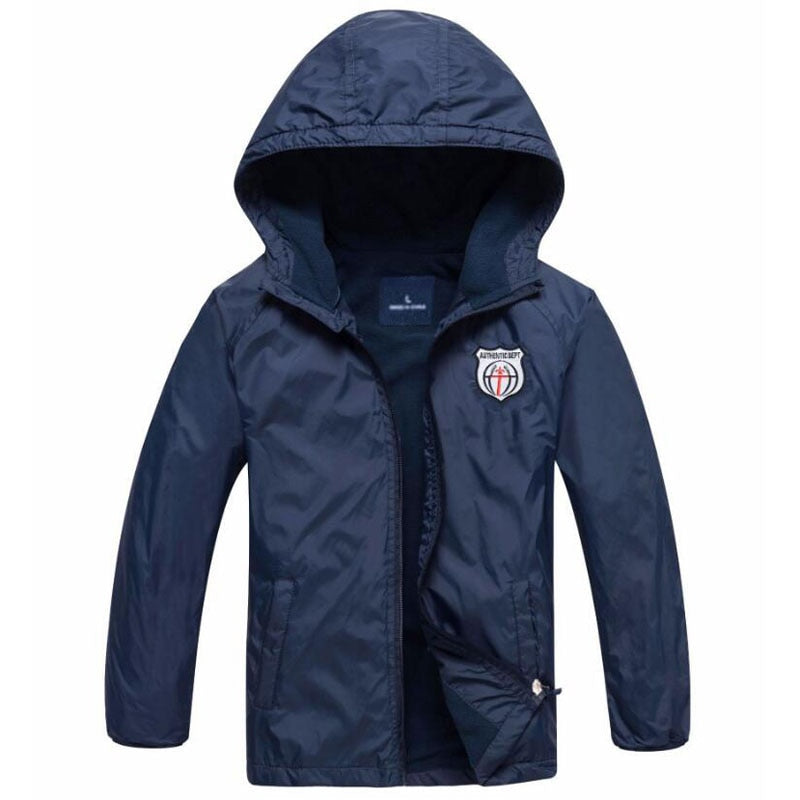 Waterproof and windproof hooded jacket, perfect for the colder months. Made of durable polyester, this stylish and comfortable jacket comes in different colors and sizes to suit your child's preferences.