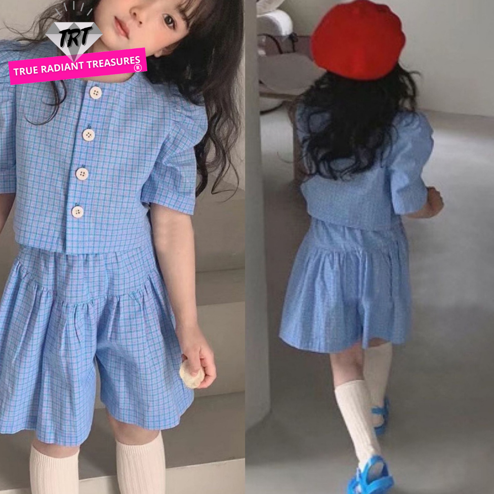 Image of Short-Sleeved Tops and Culottes Set - Fun and stylish outfit for girls. Includes a unique puff sleeve style top and culottes shorts. Perfect for walks and playtime in the park. Let your daughter make this her favorite pick!