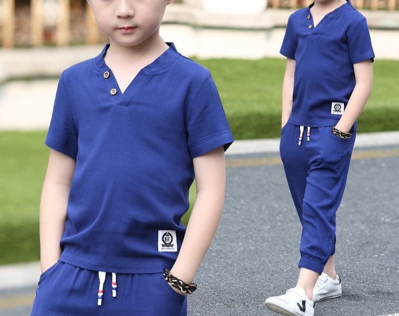 Pure Cotton Boy's Shirt and Shorts set in various colors and sizes, made from breathable cotton material. Ideal for active boys who sweat easily. Features v-neck design and comfortable fit. Please check sizing charts before ordering.