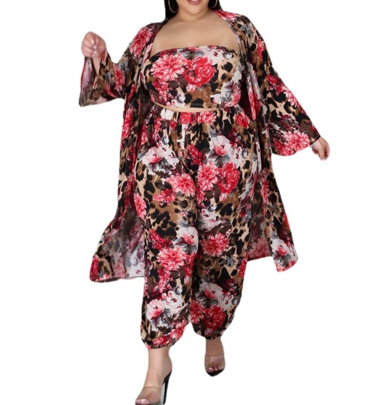 A 3-Piece Floral Set made of polyester with a stretchy waist that can be worn all year round. Perfect for the fall season, this outfit is easy to put together and take off. The set includes a long sleeve coat, sleeveless top, and pants that can be worn separately. Stay comfortable and stylish with this versatile ensemble!