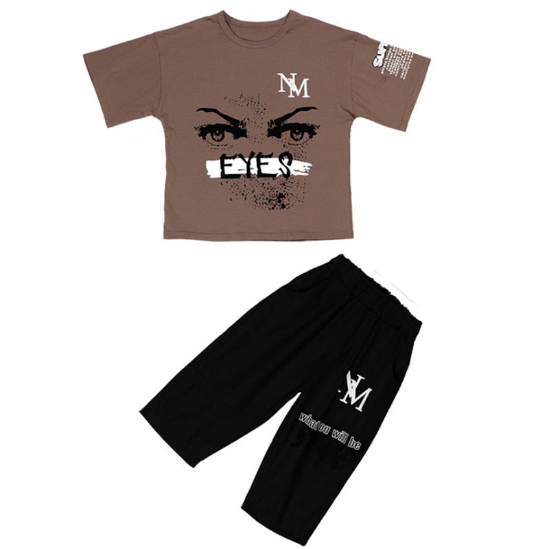 Image of a cartoon T-shirt and short pants set, made from a comfortable and durable blend of cotton and spandex. Perfect for active boys during playtime and sports activities. Fun and stylish designs available in multiple sizes for a perfect fit.